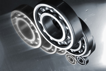 ball bearings mirrored in titanium background