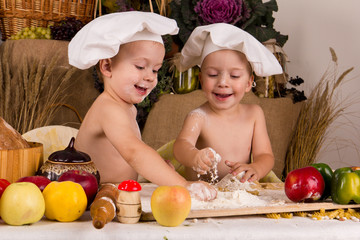 Kids dressed as chefs cooking