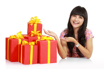 attractive asian woman with a lot of gift boxes.