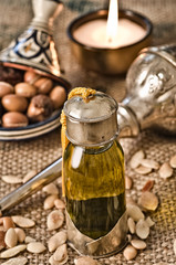 Still life of argan oil with fruits © luisapuccini