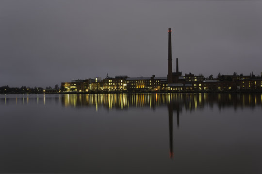 Industrial view by sea at night