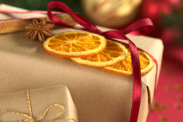 Christmas presents decorated with dried orange slice