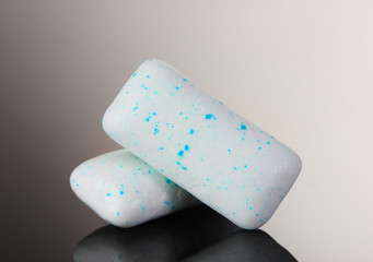 Chewing gums on gray background