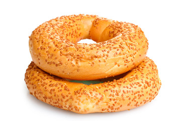 delicious bagels with sesame seeds isolated on white
