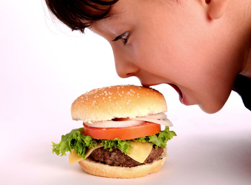 Boy Eating Hamburger