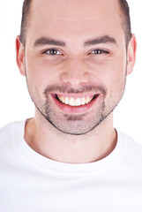 Obraz premium Portrait of the young happy smiling man