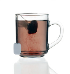 glass teacup with tea bag