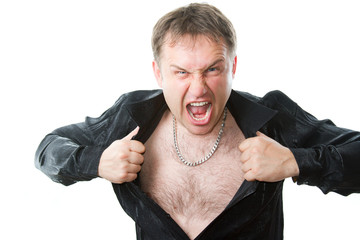 crazy evil man rips his shirt on his hairy chest