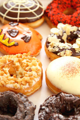 Varieties of decorated donuts