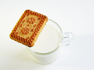 A glass of milk and cookies