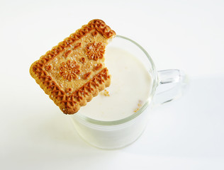 A glass of milk and cookies