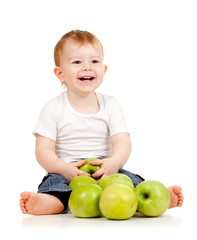 Fototapeta premium Adorable child with green apples
