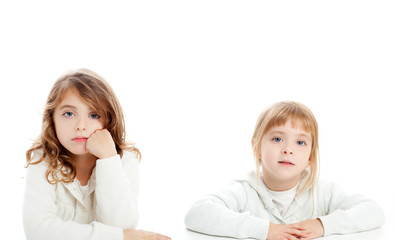 blond and brunette kid girls portrait on white