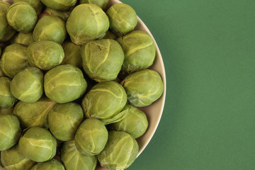 Fresh brussels sprout on green