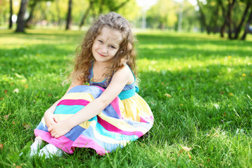 Fototapeta premium Little girl in summer park