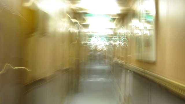 Walk in circles around cruise liner at night, blurred vision