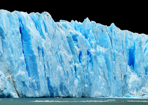 Blue icebergs isolated on black