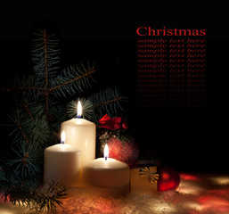 Christmas. Three candles and blue spruce