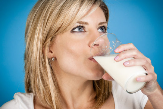 Woman Drinking Glass Of Milk
