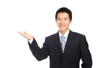 Fototapeta na wymiar Young business man smile introduce with hand gesture
