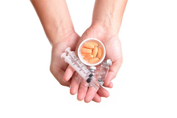 medication and syringe needle with Hand holding