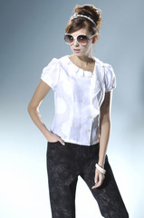 fashion model wearing modern sunglasses posing