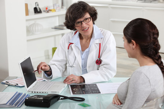 Doctor discussing a patient's results with her
