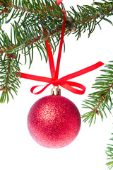 red christmas ball hanging from tree