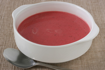 beet soup in white bowl
