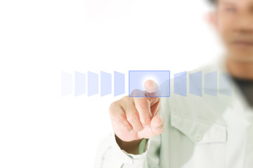 hand pushing a button on a touch screen interface