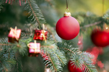 Christmas decorations on Christmas tree. Shallow depth of field