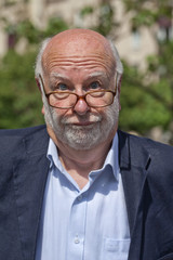 funny old man squinting