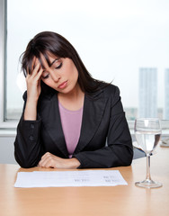 Business Woman Sitting at her Desk