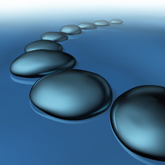 Smooth pebble stones in water