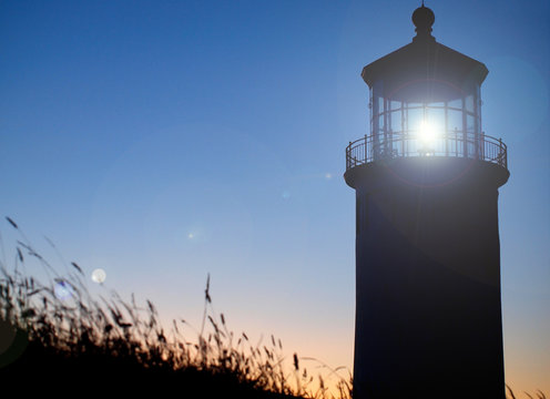 Light Shining in the North Head Lighthouse at Sunset