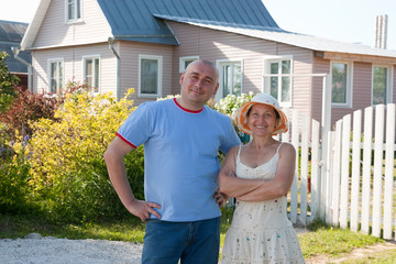 man and woman near gate