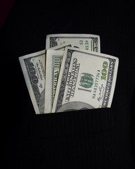 money in black skirt pocket