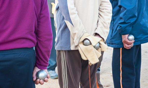 Players Bocce Ball  Back With The Ball In Hand