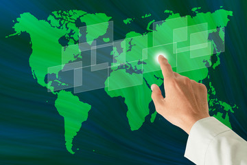 Hand pushing on a touch screen interface.