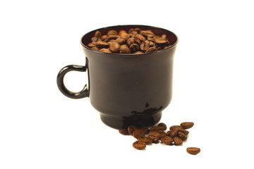 coffee beans in a cup on a white background