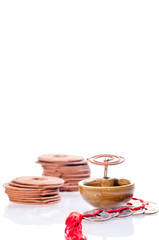 Incense coil burning with old chinese coins