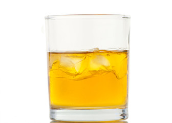 Whiskey with ice cubes. Isolated on white