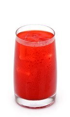 glass of red orange juice with ice on white background