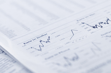 Business graph in newspaper