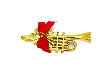 Golden christmas trumpet  and red ribbon on a white background