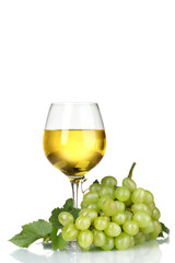 Ripe grapes, wine glass and bottle of wine isolated on white