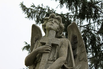 Sculpture of angel with cross