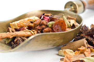 herbal tea with leaves, fruits and herb