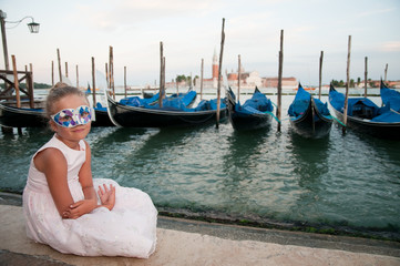 Obraz na płótnie Canvas Carnival in Venice - beautiful girl in carnival mask
