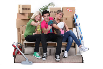 Young people moving into a new home